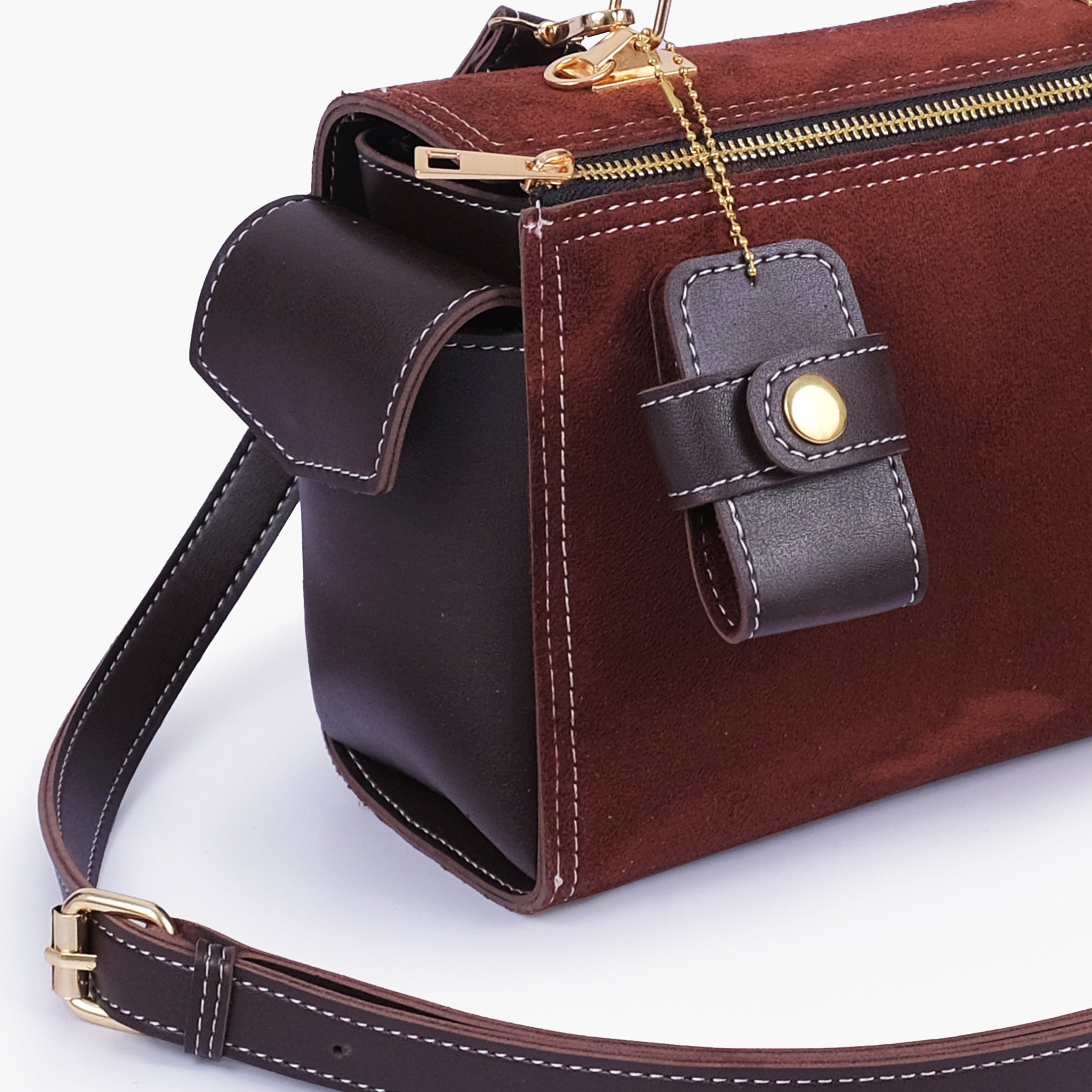 Dark brown suede bowling bag with top-handle