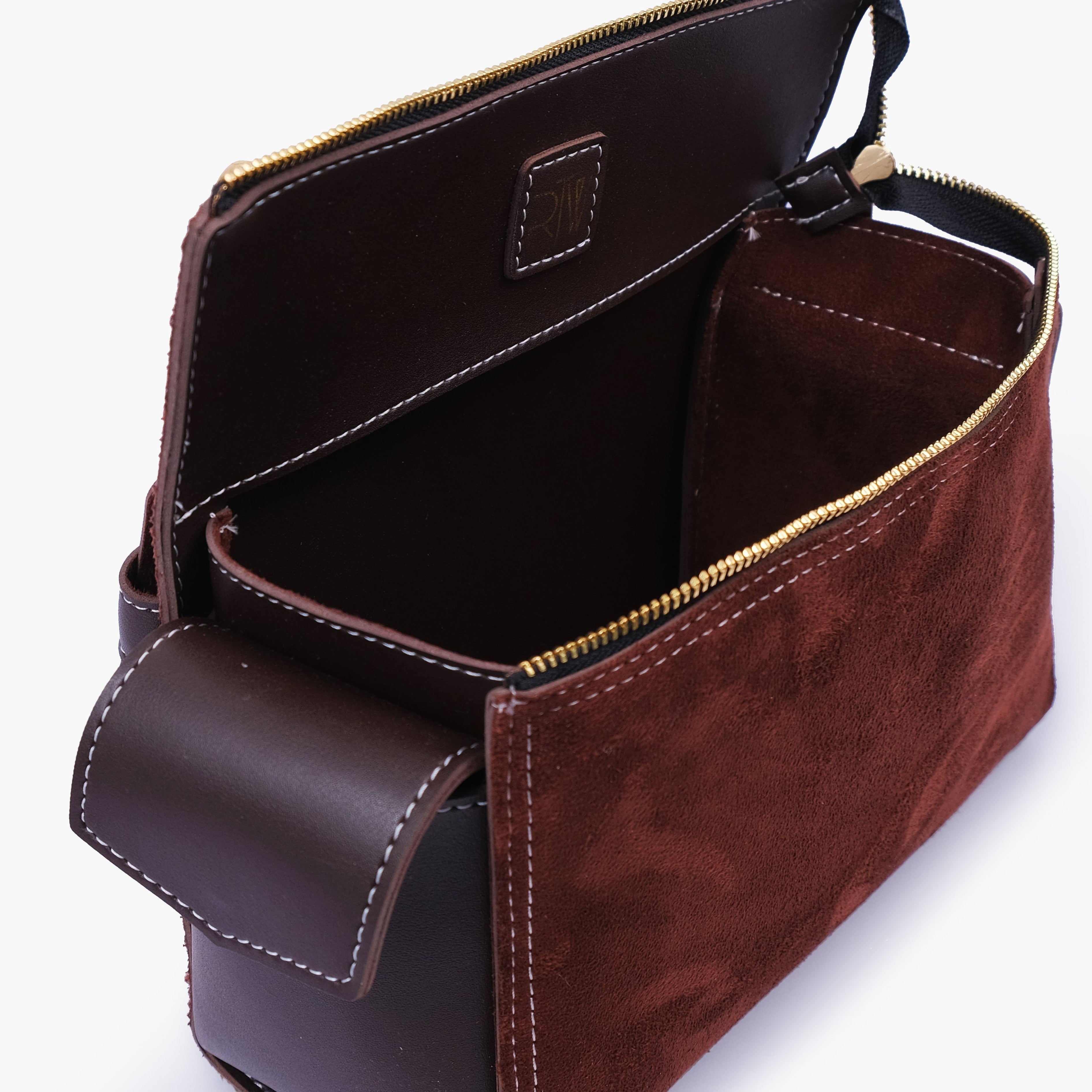 Dark brown suede bowling bag with top-handle