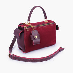 Burgundy suede bowling bag with top-handle