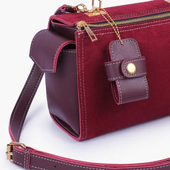Burgundy suede bowling bag with top-handle
