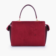Burgundy suede bowling bag with top-handle