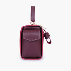 Burgundy suede bowling bag with top-handle
