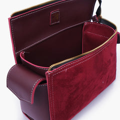 Burgundy suede bowling bag with top-handle