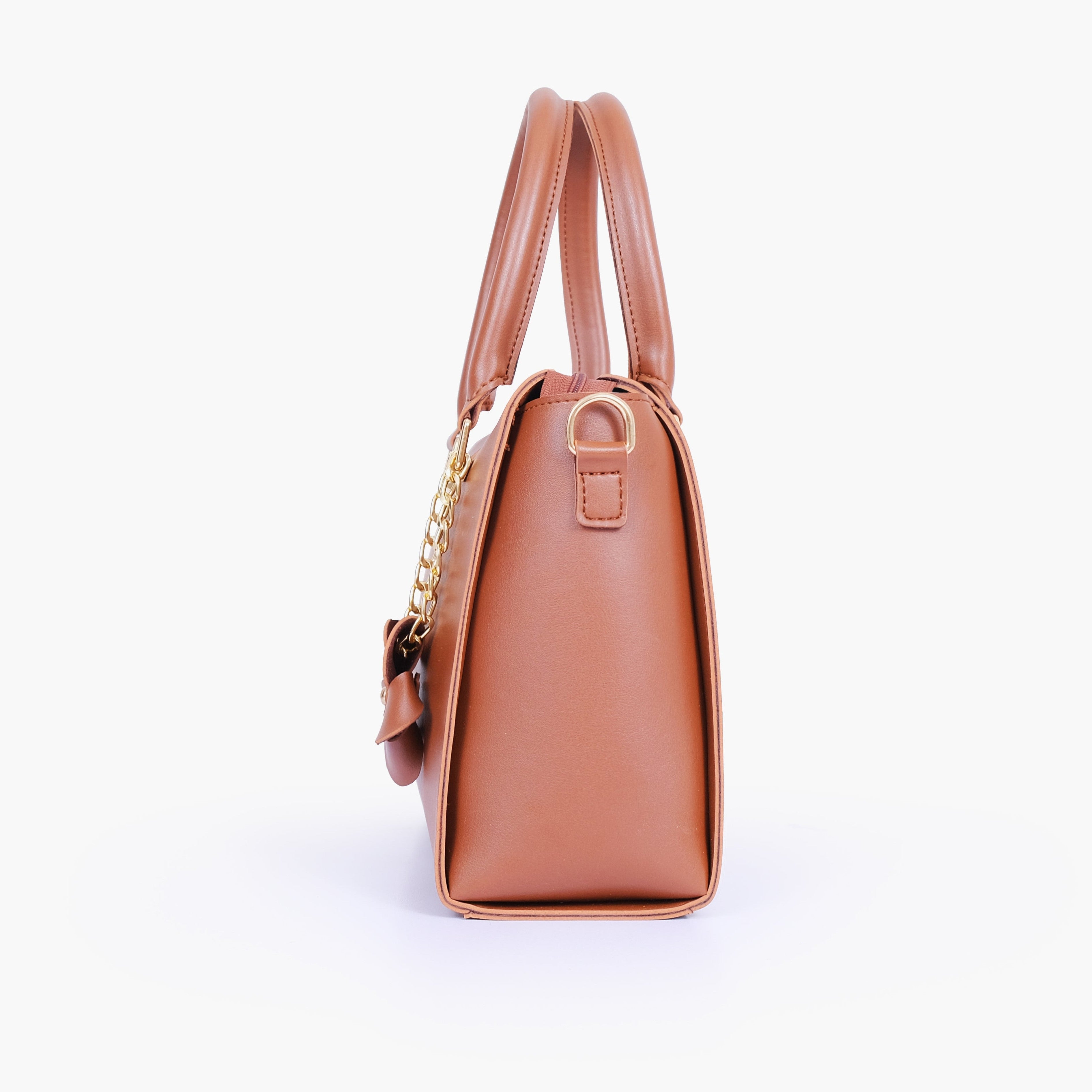 Brown handbag with flower charm