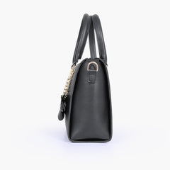 Black handbag with flower charm