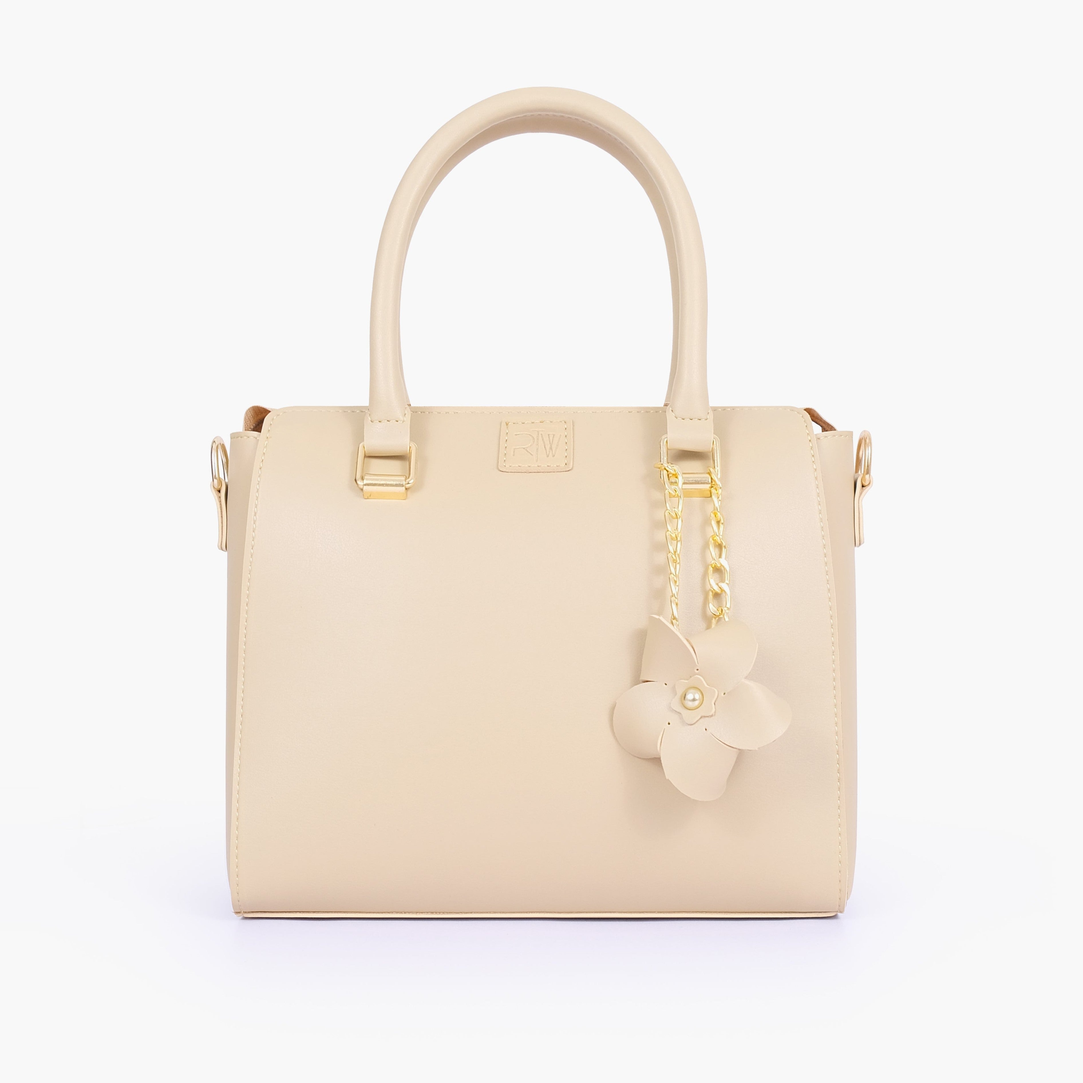 Off-white handbag with flower charm