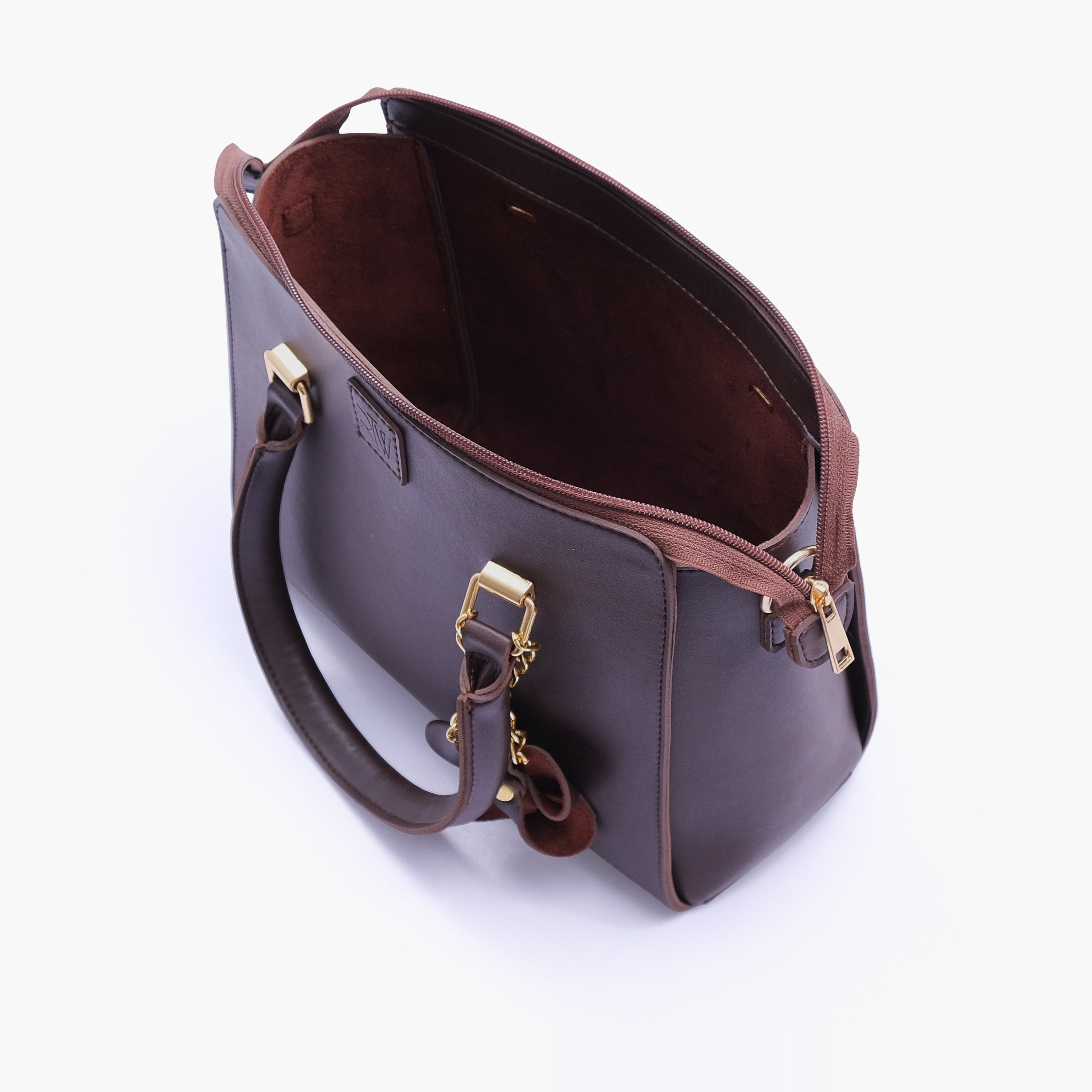 Dark brown handbag with flower charm