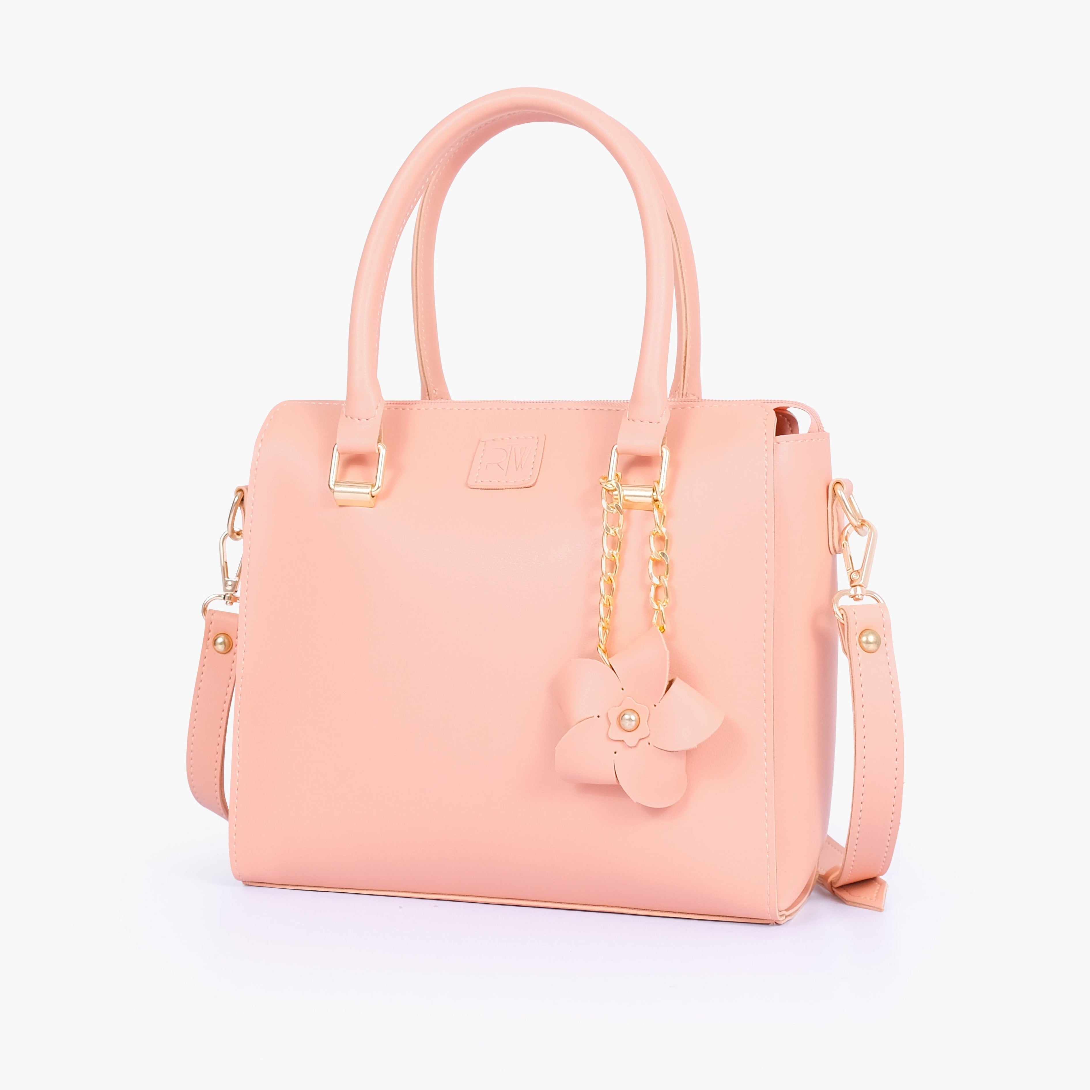 Peach handbag with flower charm
