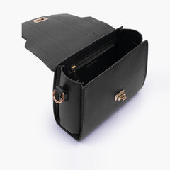 Black compact top-handle cross-body bag