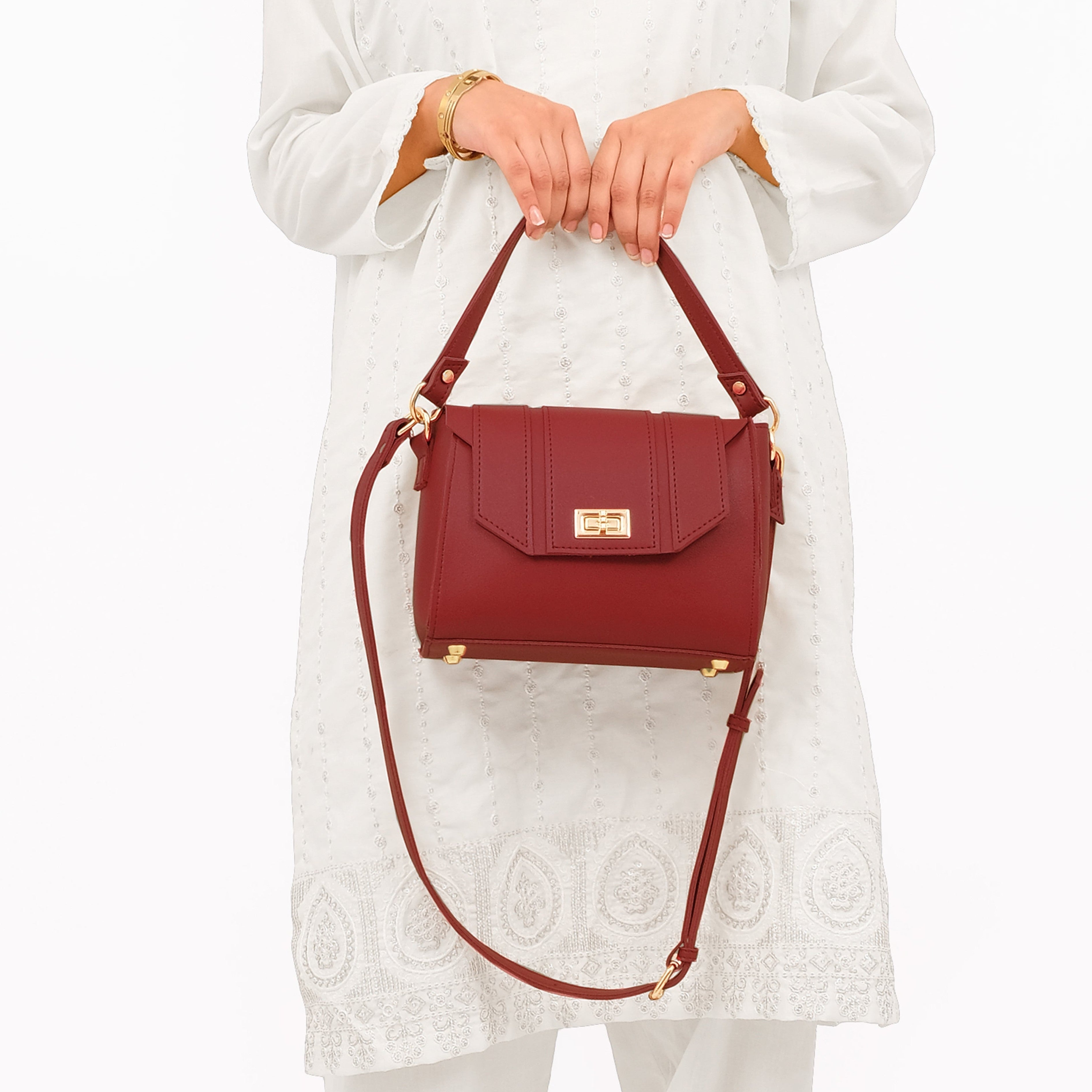 Maroon compact top-handle cross-body bag