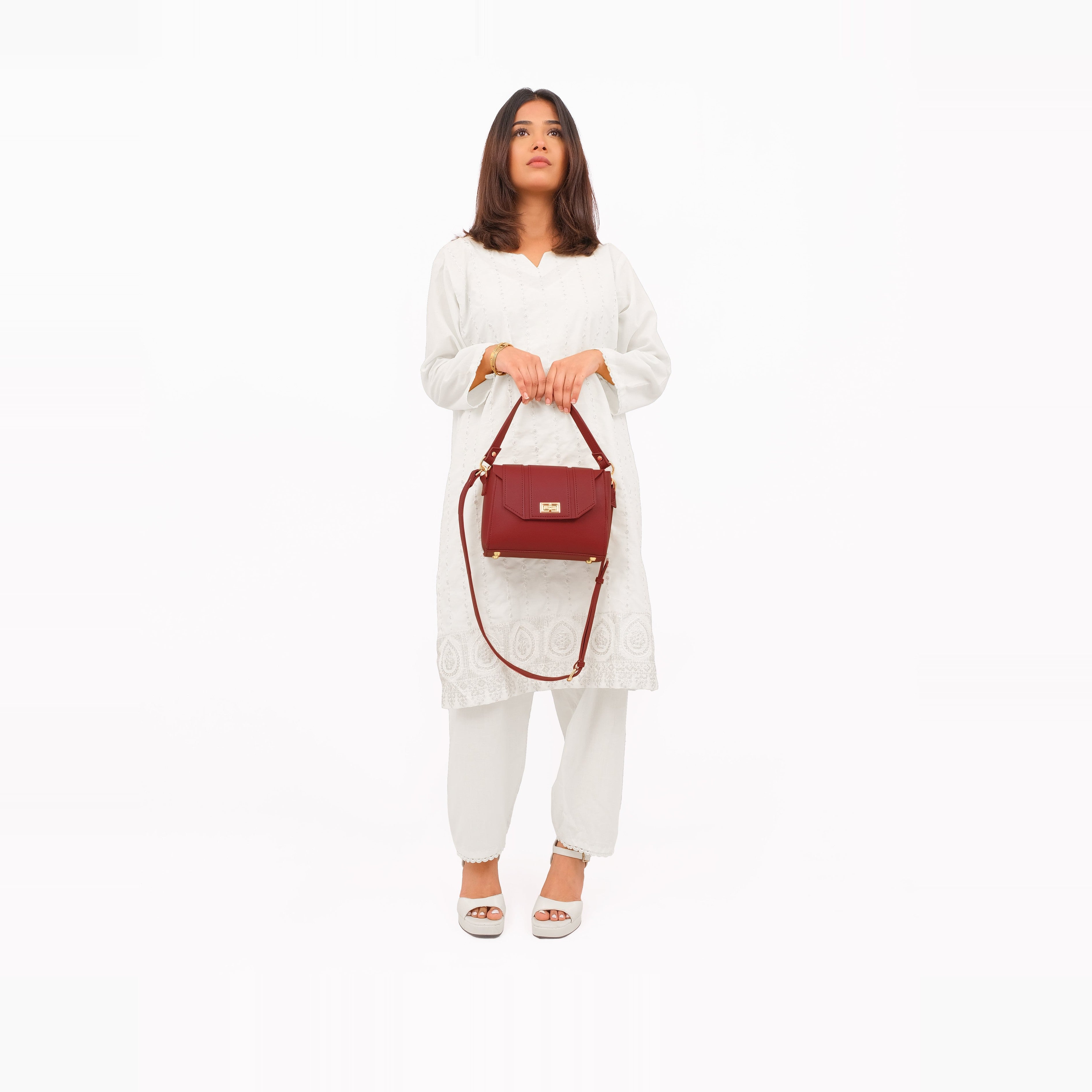 Maroon compact top-handle cross-body bag