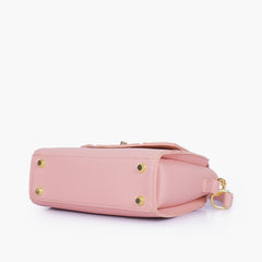 Pink compact top-handle cross-body bag