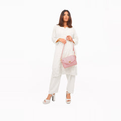 Pink compact top-handle cross-body bag