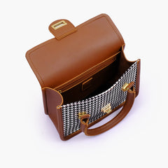 Brown and white houndstooth cross-body with flap