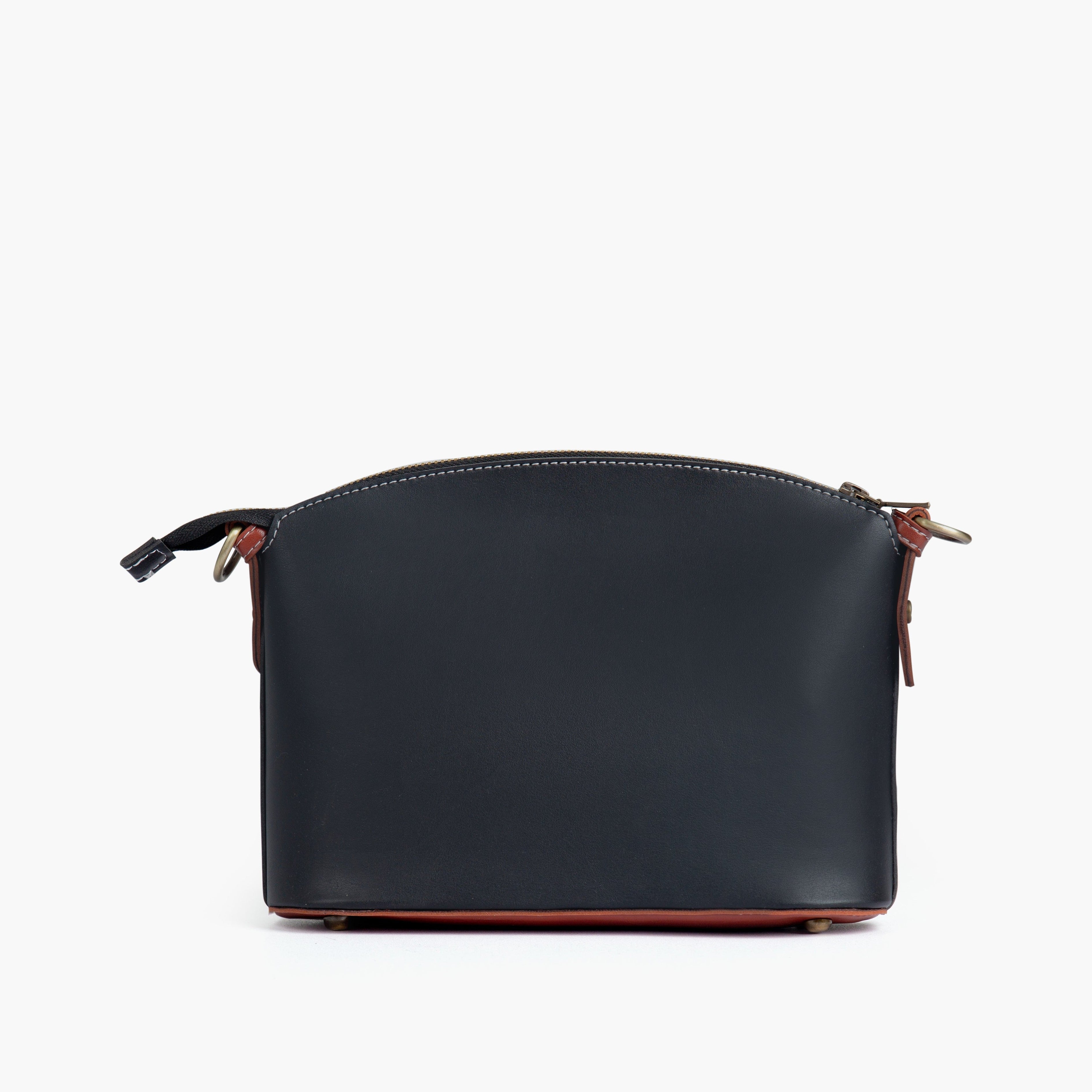 Black and rust dome cross-body bag
