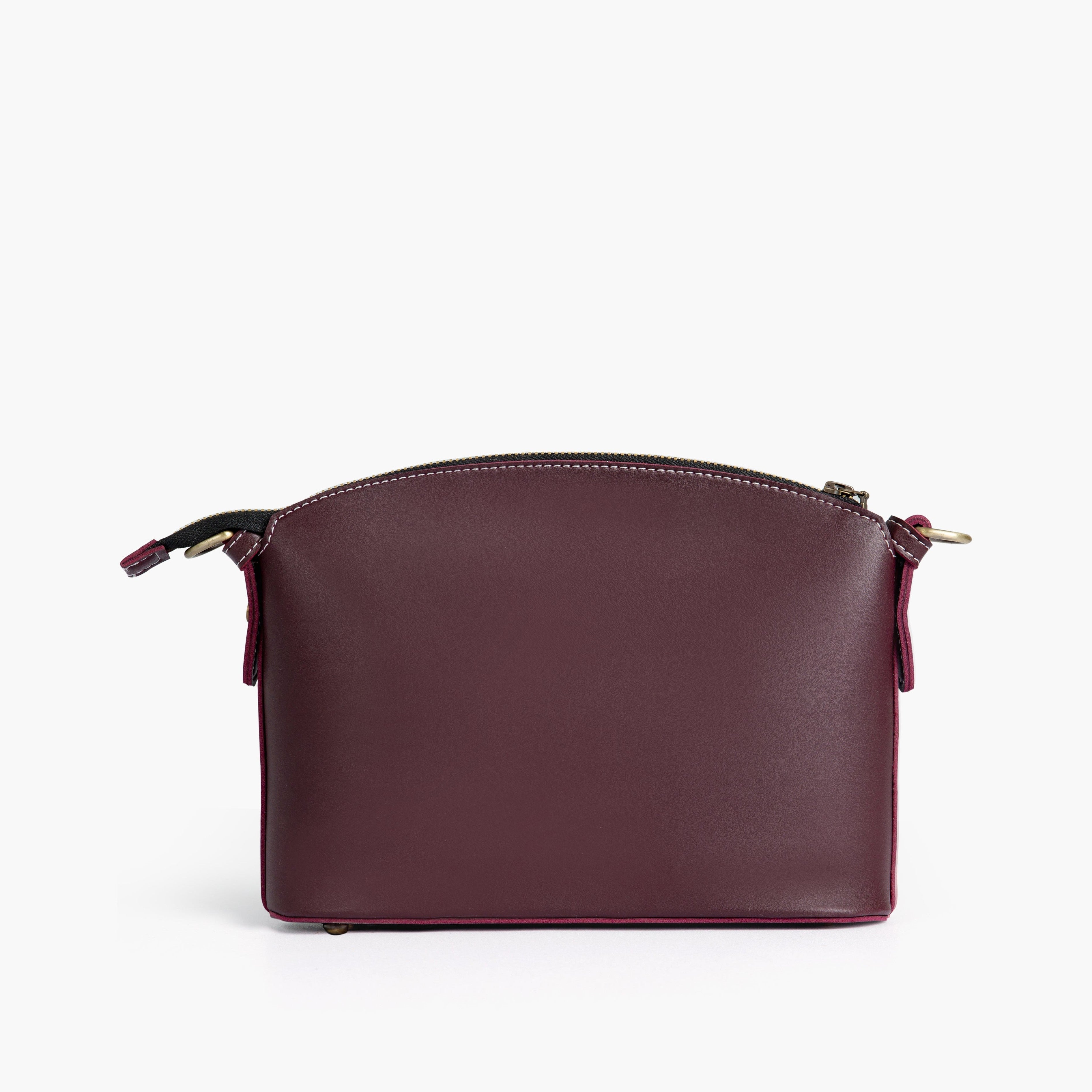 Burgundy dome cross-body bag