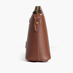 Brown dome cross-body bag