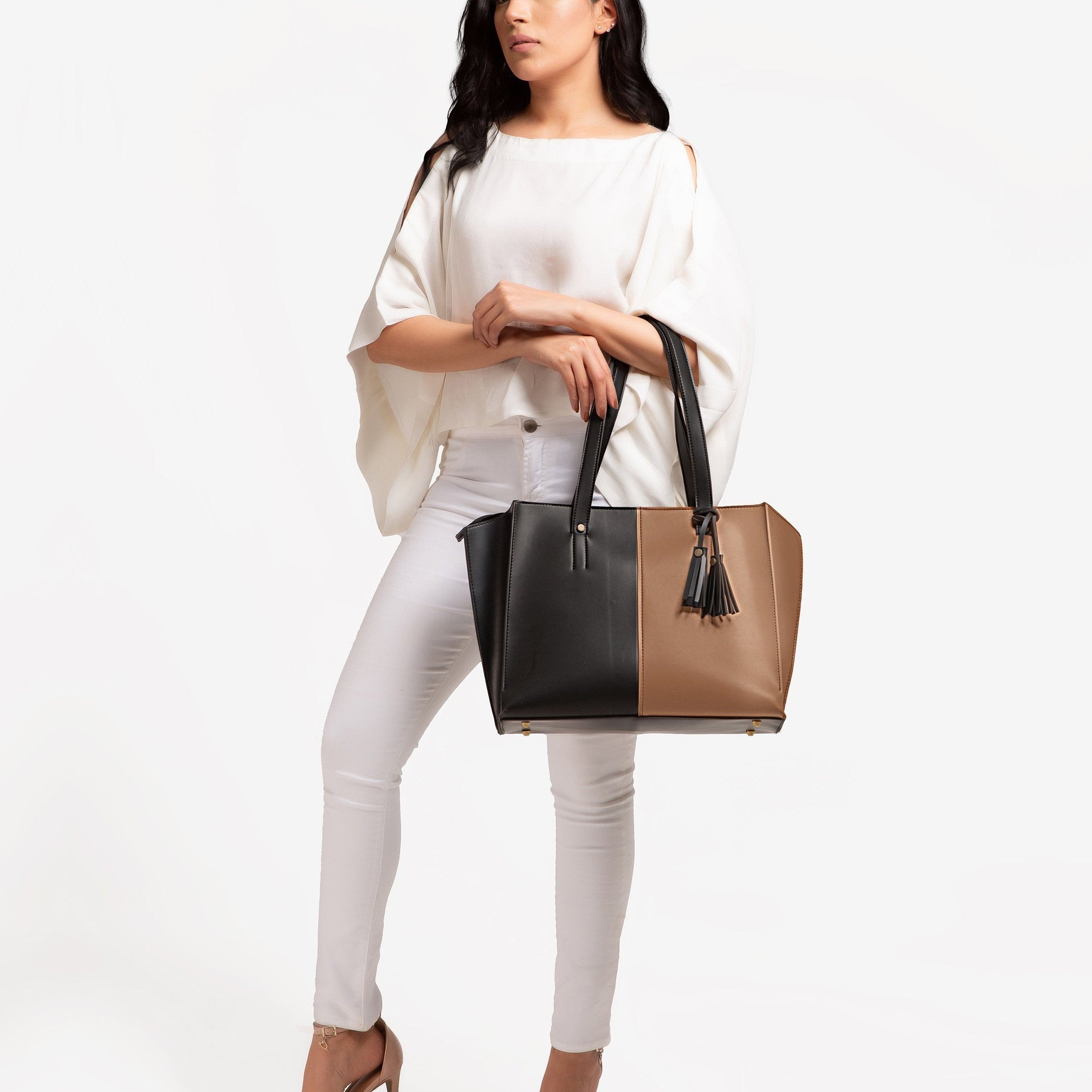 Tan and black over the shoulder tote bag
