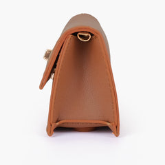 Tan elongated clutch bag