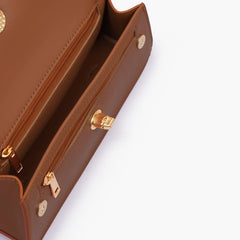 Tan elongated clutch bag
