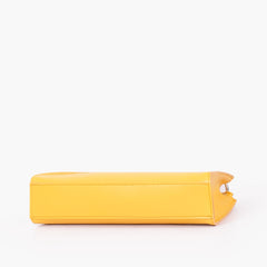 Yellow elongated chain handle purse
