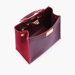 Burgundy suede front lock top-handle mini bag