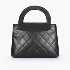 Black flap quilted bag with top handle
