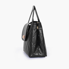Black flap quilted bag with top handle