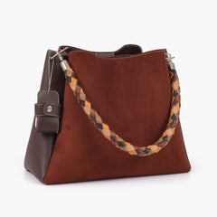 Dark brown suede handbag with braided handle