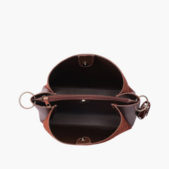Dark brown suede handbag with braided handle
