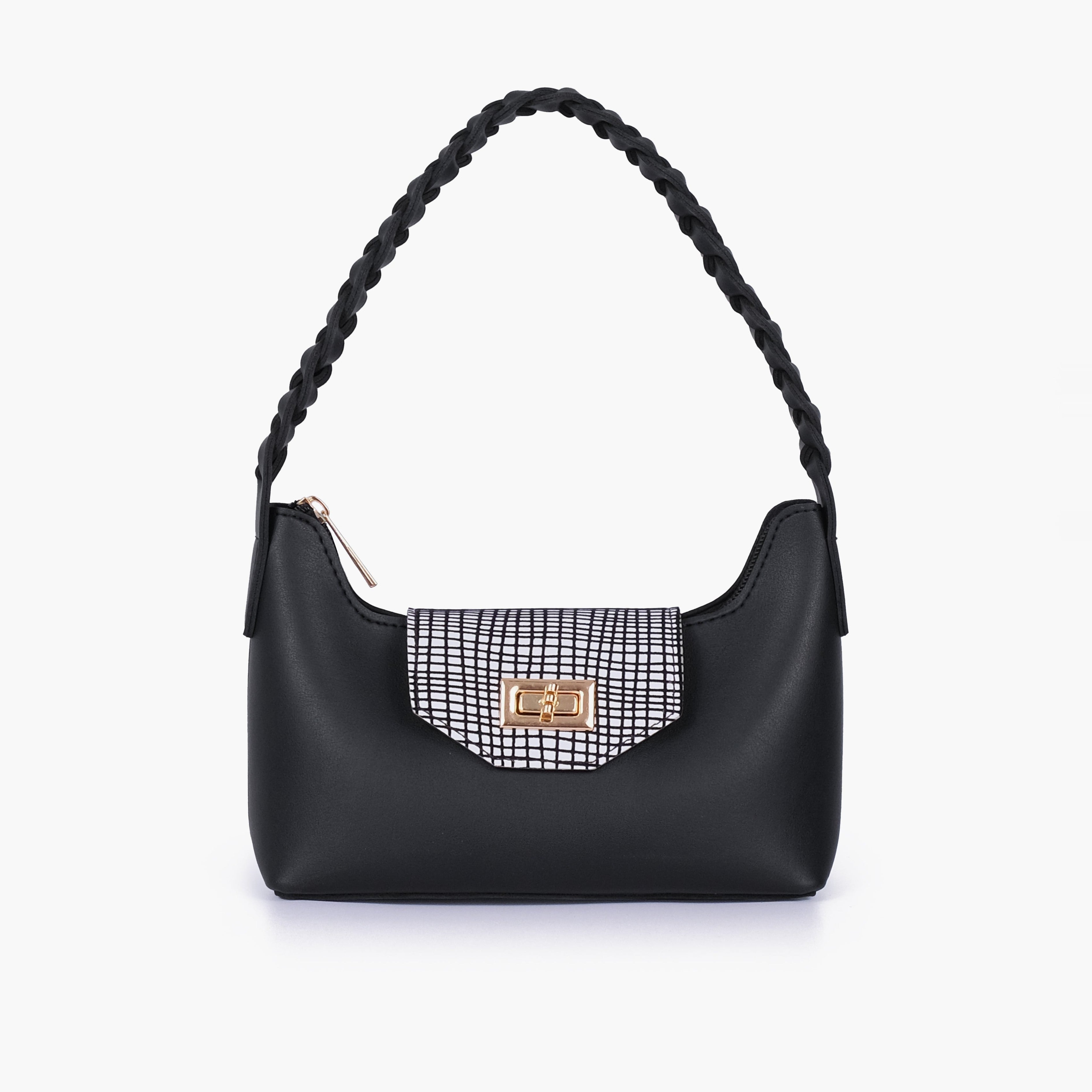 Black and white purse with braided strap
