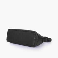 Black and white purse with braided strap