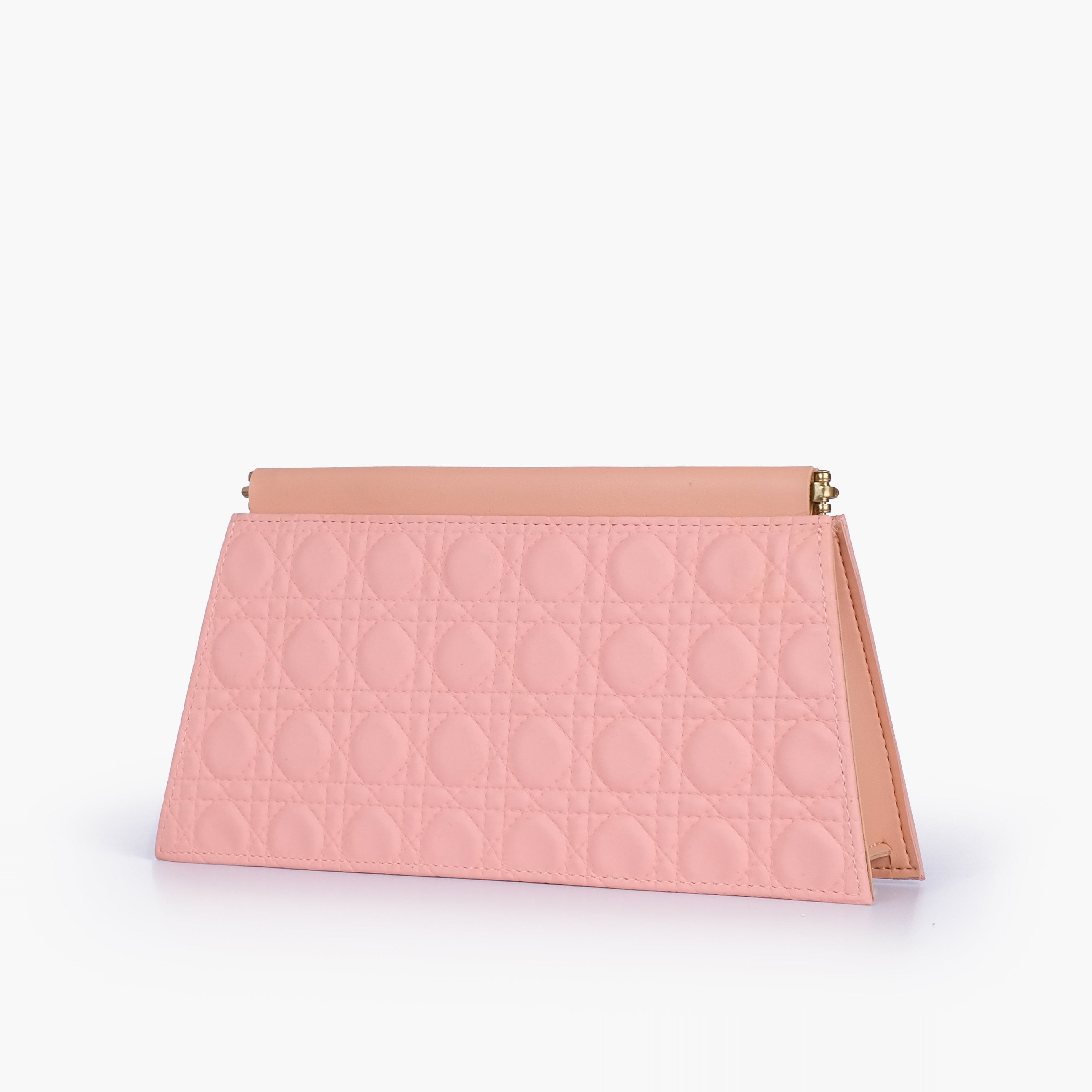 Peach quilted evening clutch with snap closure