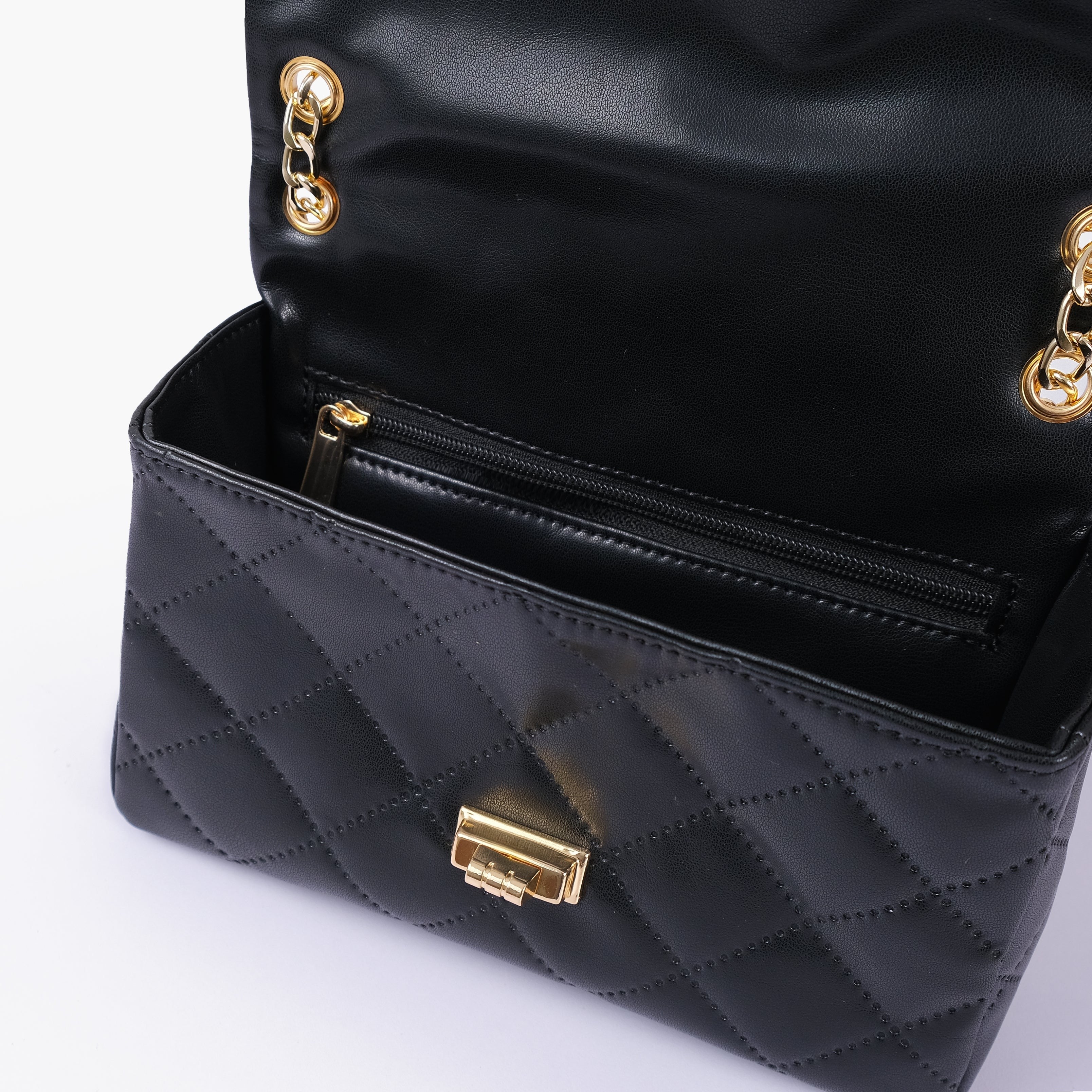 Black quilted mini bag with chain