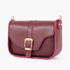 Burgundy saddle buckle bag