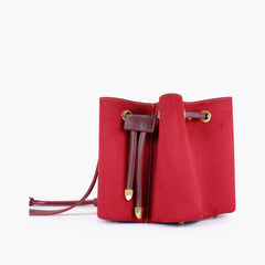 Burgundy suede star drawstring bucket bag