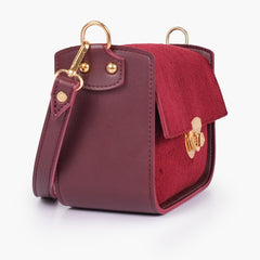 Burgundy suede saddle bag with twist lock