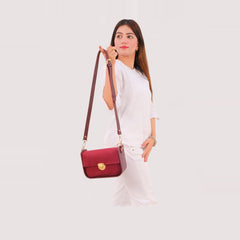 Burgundy suede saddle bag with twist lock