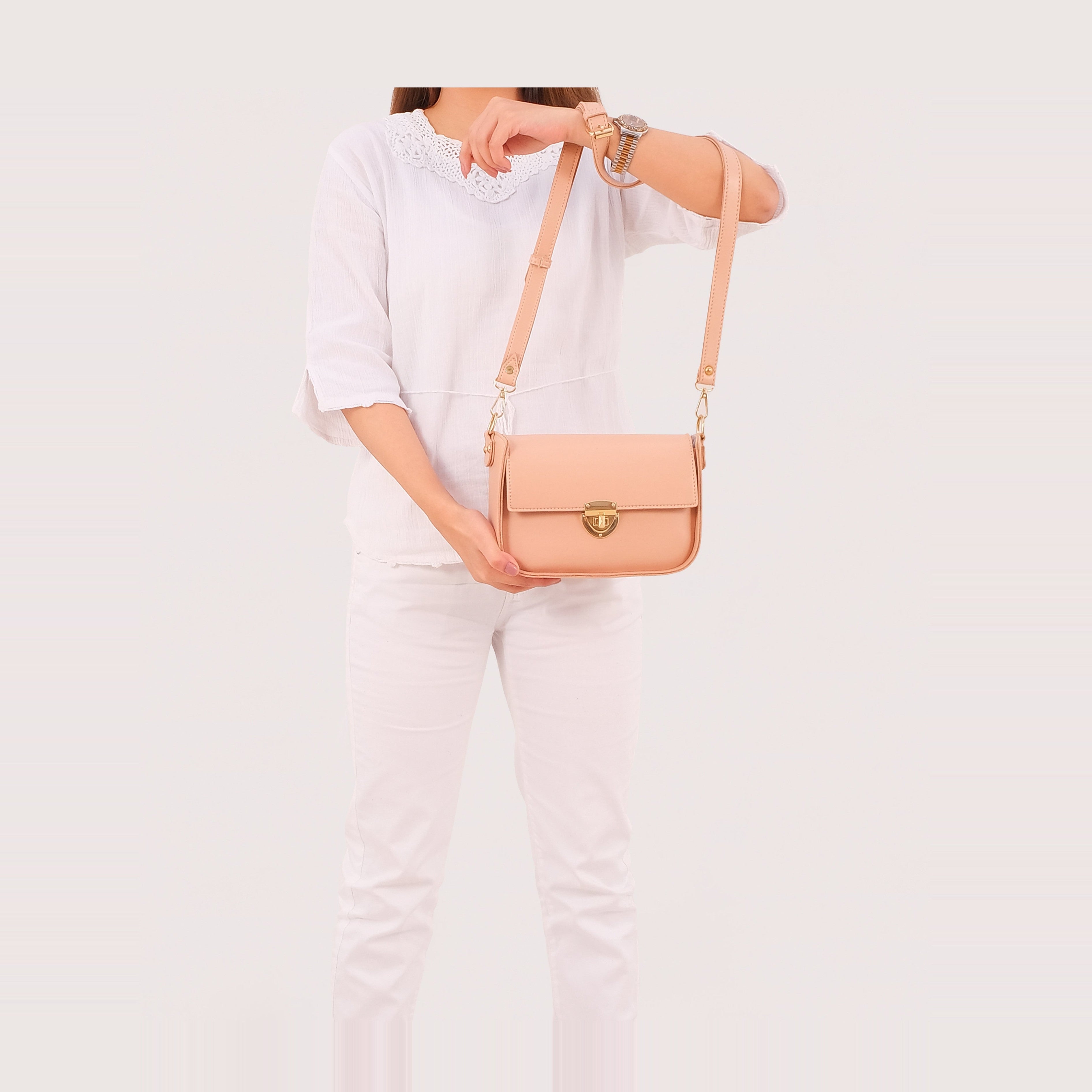 Peach saddle bag with twist lock