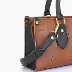 Brown and black on-the-go mini bag