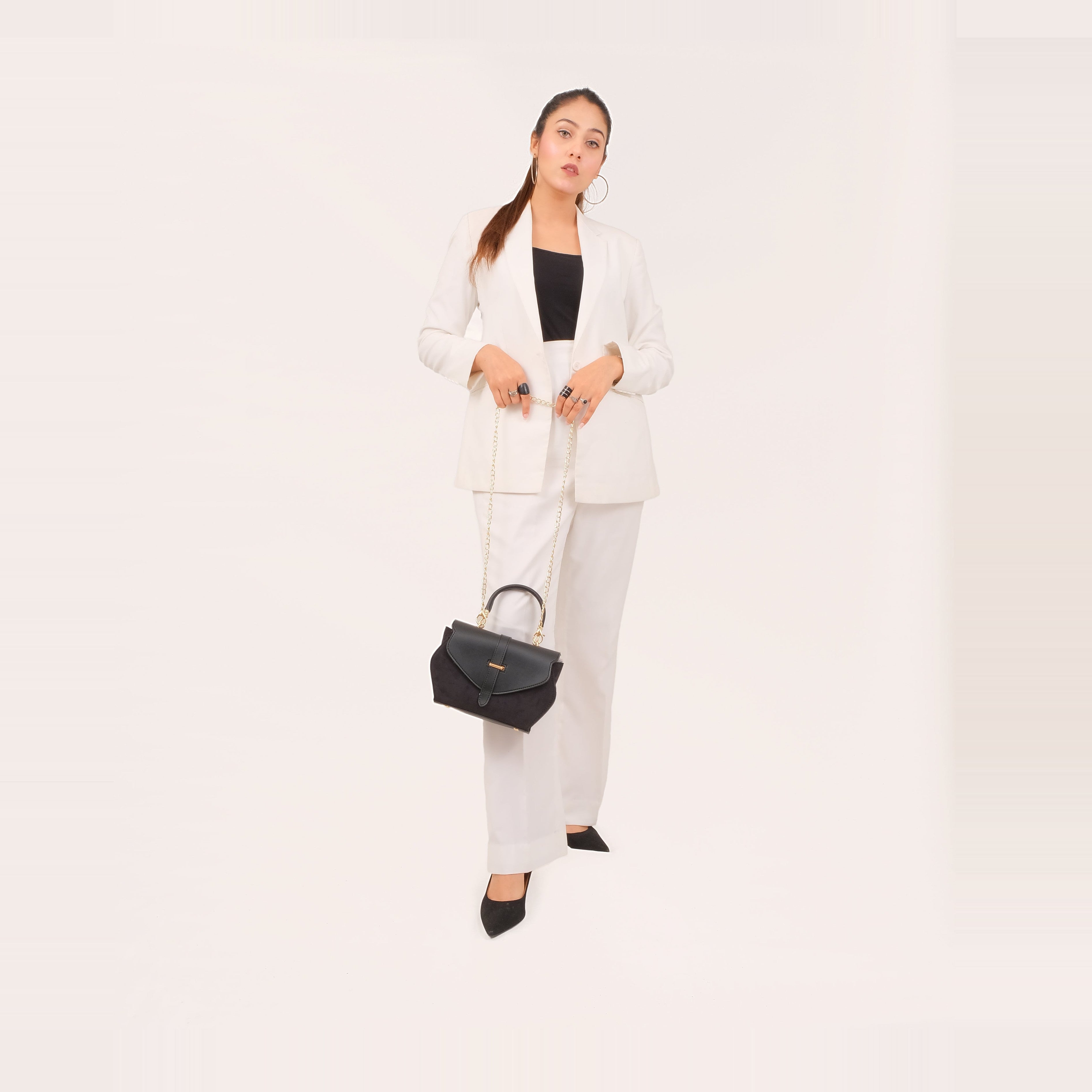 Black top-handle hexagon bag