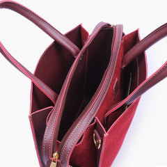 Burgundy suede trapeze top-handle bag