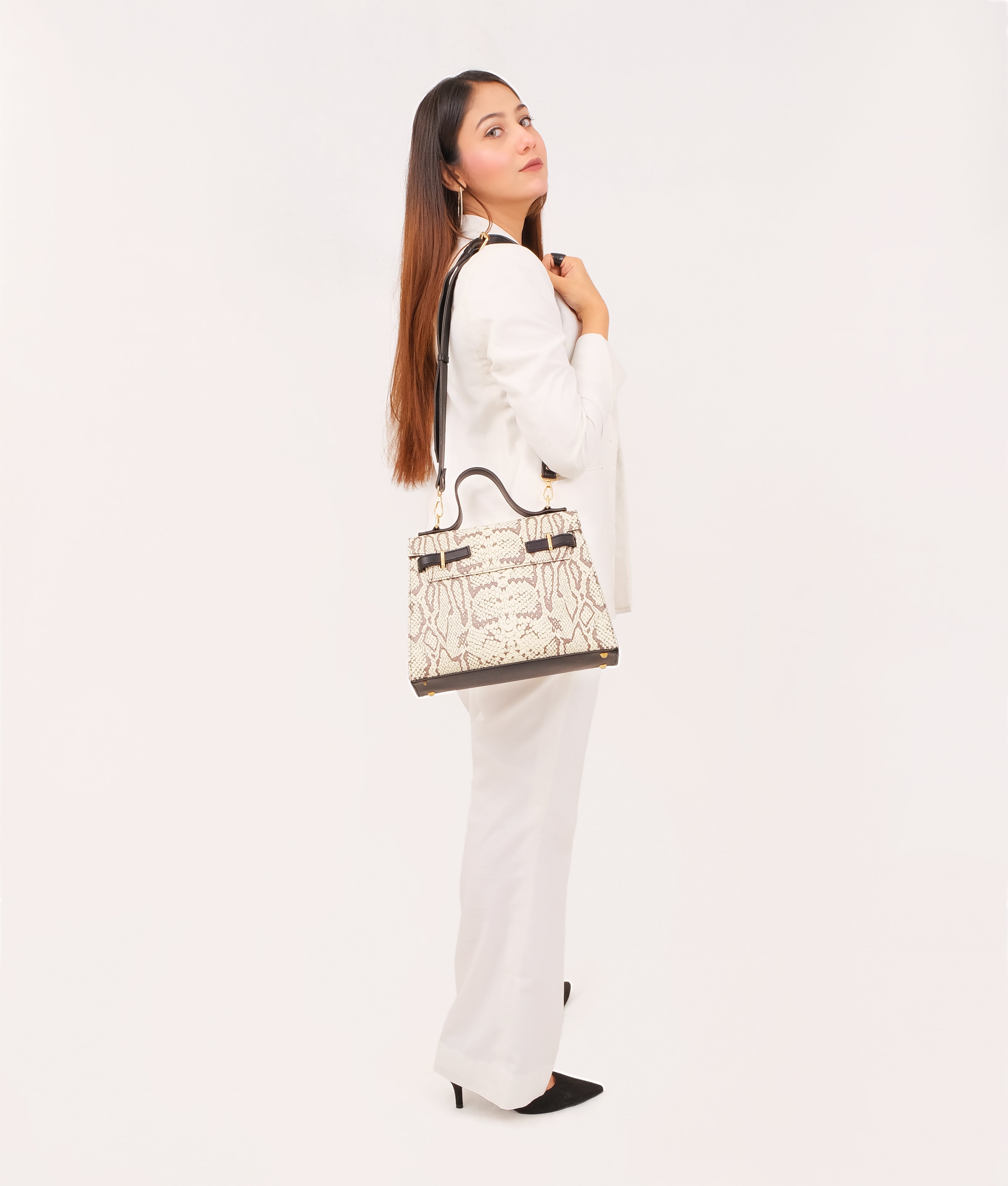 Black and white crocodile cross-body bag with top-handle