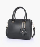 Black handbag with flower charm