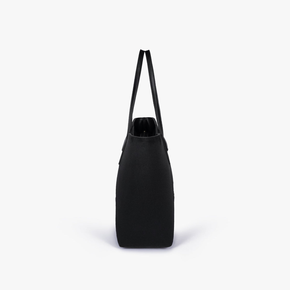 Side profile of Black suede Arc tote bag