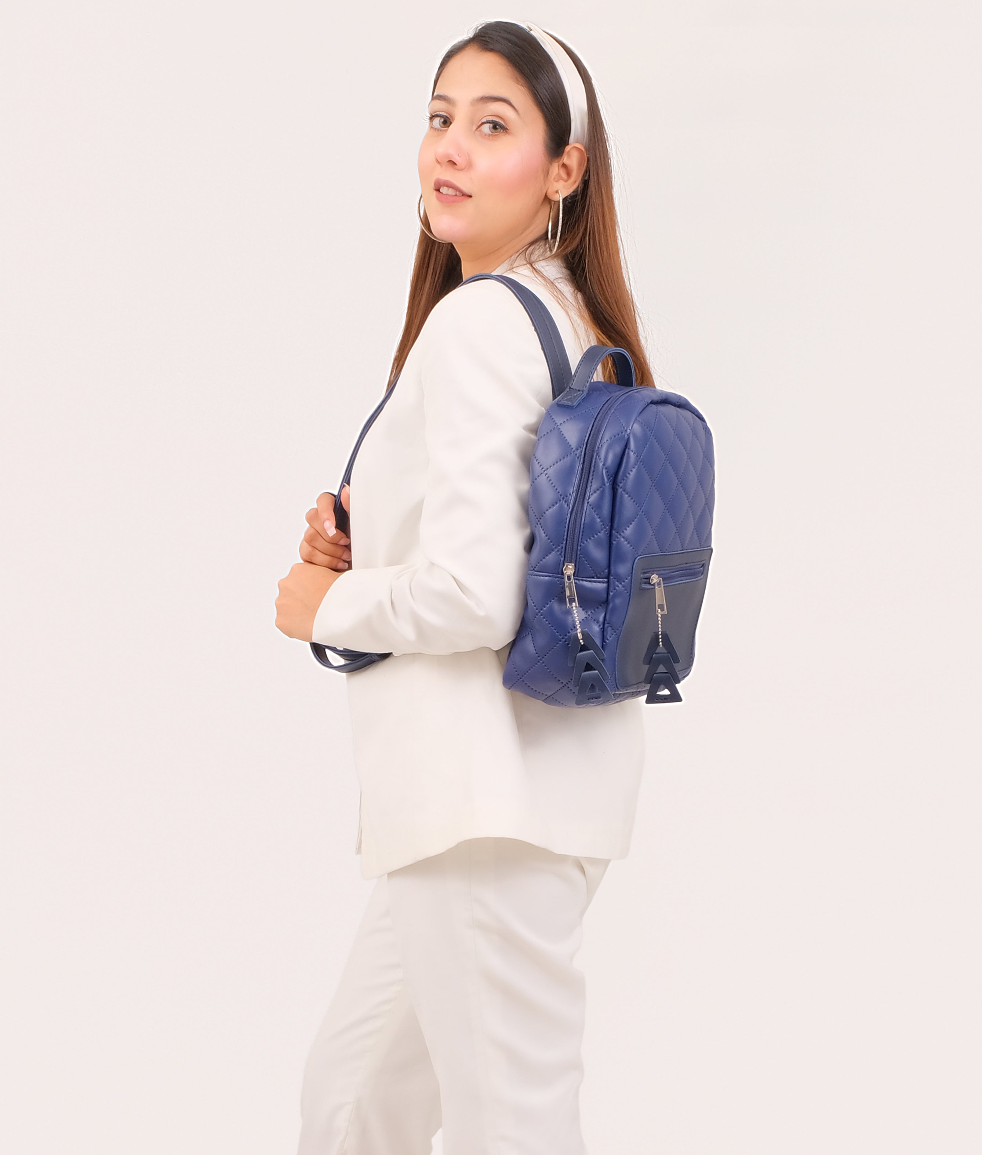 Blue quilted mini backpack