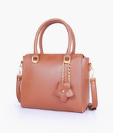Brown handbag with flower charm