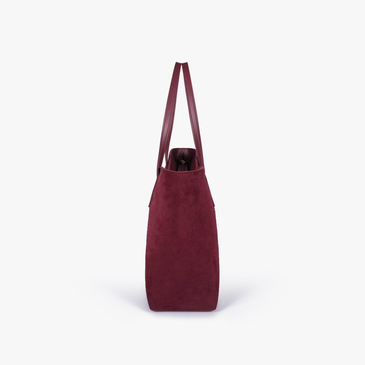 Side profile of Burgundy suede Arc tote bag