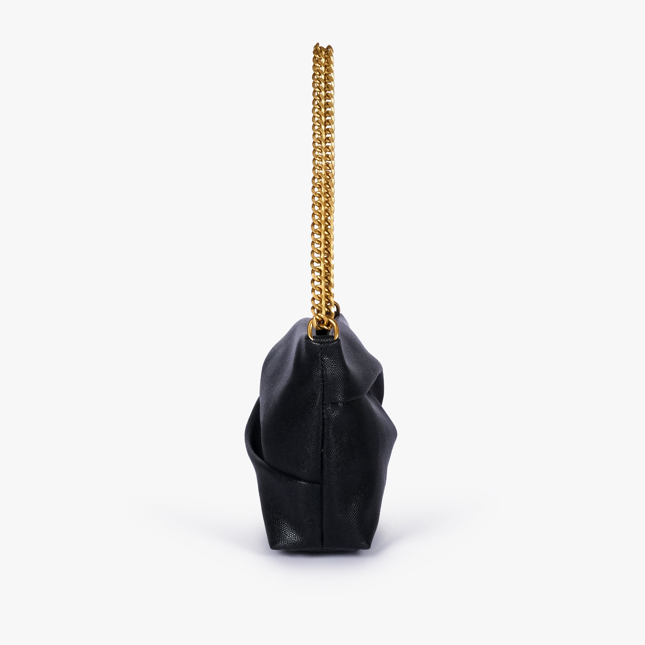 Black pleated clutch bag with chain — side profile showing the narrow gusset, chain attachment and folded panel construction, deep black