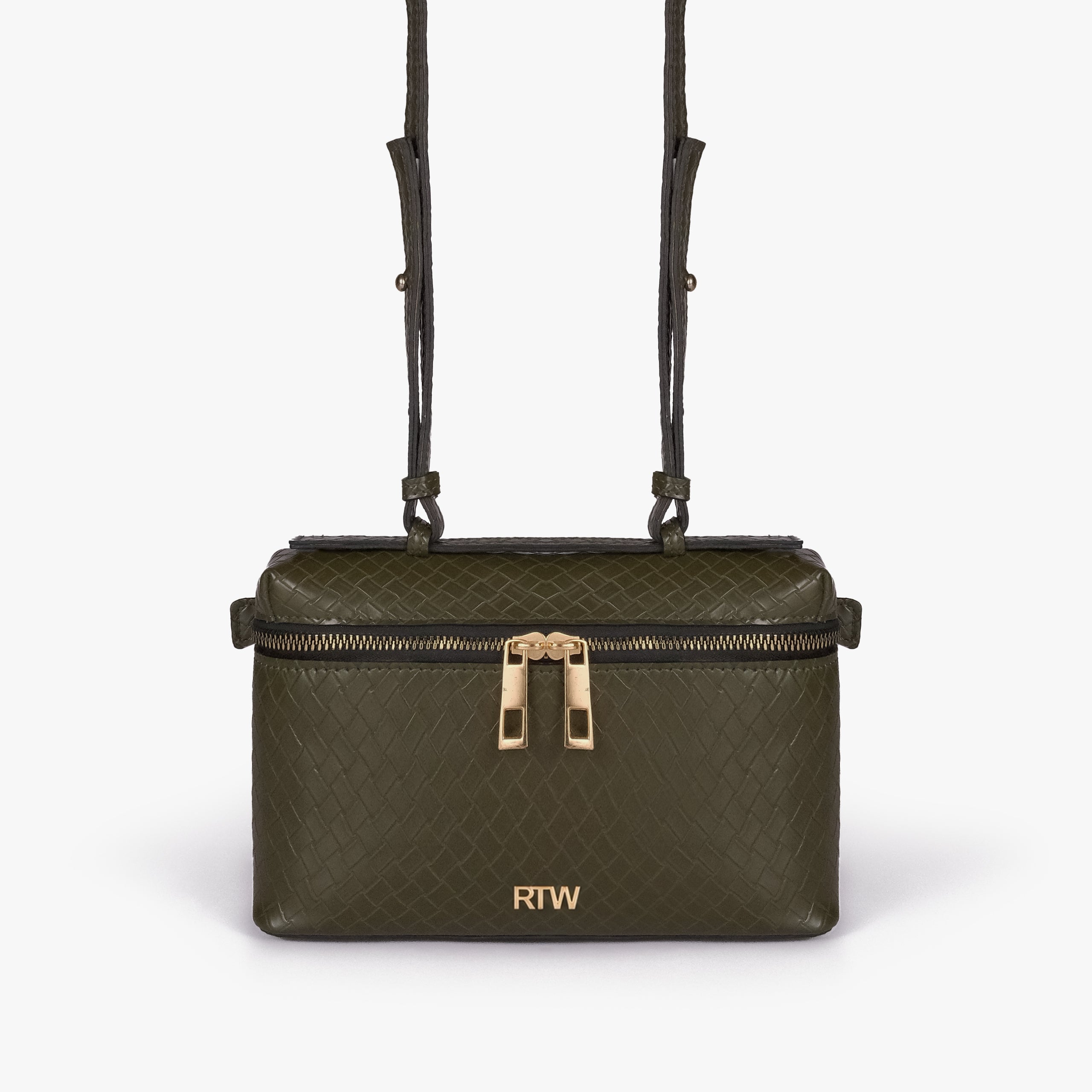 Olive green weave vanity top-handle bag — front straight-on view showing the diamond-quilted vanity body, short top handle, long strap, wraparound zipper, and small front logo mark